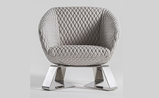 Contemporary Armchair with Bold Metal Base 